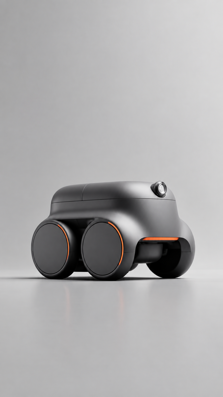 Sleek black robotic vacuum cleaner with orange accents for smart gadgets and cool tech collection