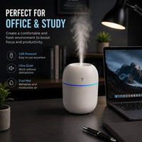 Aroma diffuser showing 5 color changing soft LED mood lights in a dark room