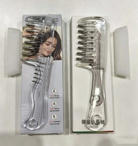 Close-up highlighting hair oil drops outputting from the functional tips of the crystal applicator comb teeth