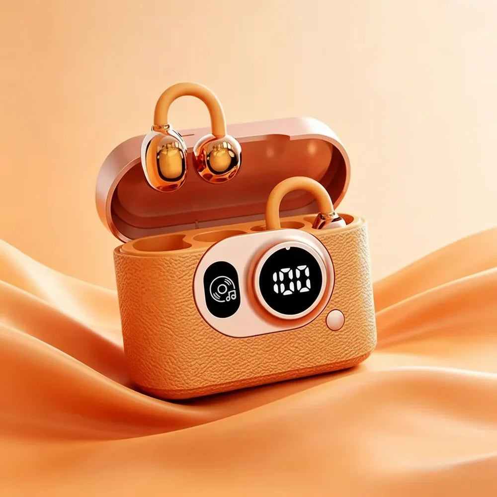 Clip on wireless earphones displayed outside the open camera design charging case