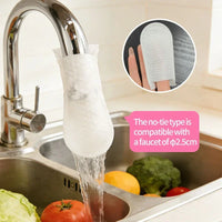 Mini faucet water filter purifier attachment being fitted securely onto a chrome kitchen tap