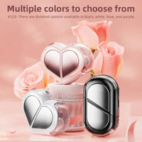 K520 heart shaped wireless earbuds in black, white, and pink with pink roses background