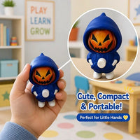 Cute silicone cartoon character keychain attached securely to a kids school backpack zipper