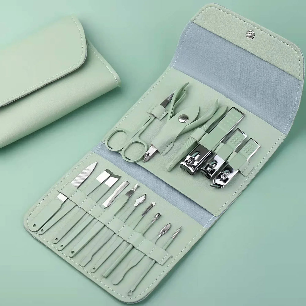 Premium 15-piece manicure pedicure grooming tool kit neatly arranged inside its leather case