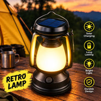 A solar-powered lantern lamp with a glowing warm light, shown on a wooden table outdoors at sunset with a tent in the background. Yellow callout icons on the right list features like solar charging, long lasting, bright light, and durable design.