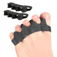 Orthopedic silicone toe separators worn comfortably between toes on a human foot