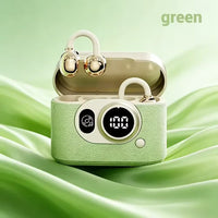 A pair of green and cream wireless earbuds with a matching textured charging case, shown open with the earbuds resting inside. The case has a small digital display and control buttons.